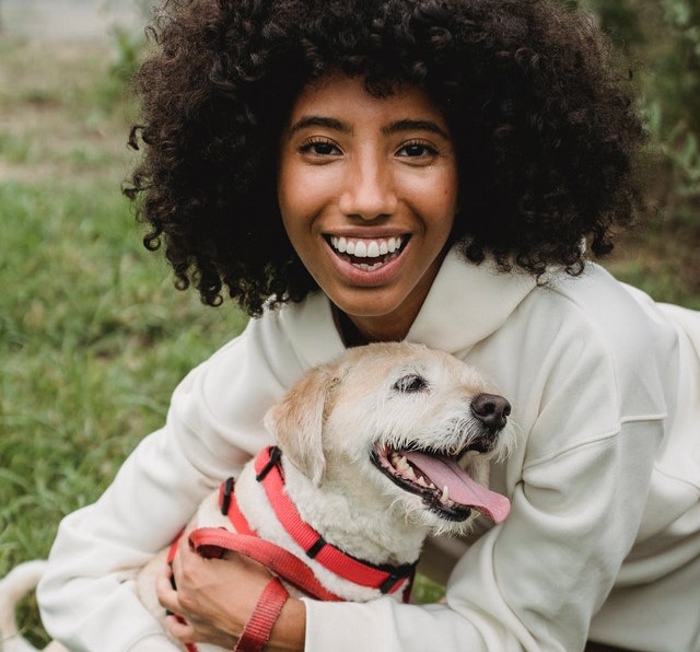 woman and dog outdoors