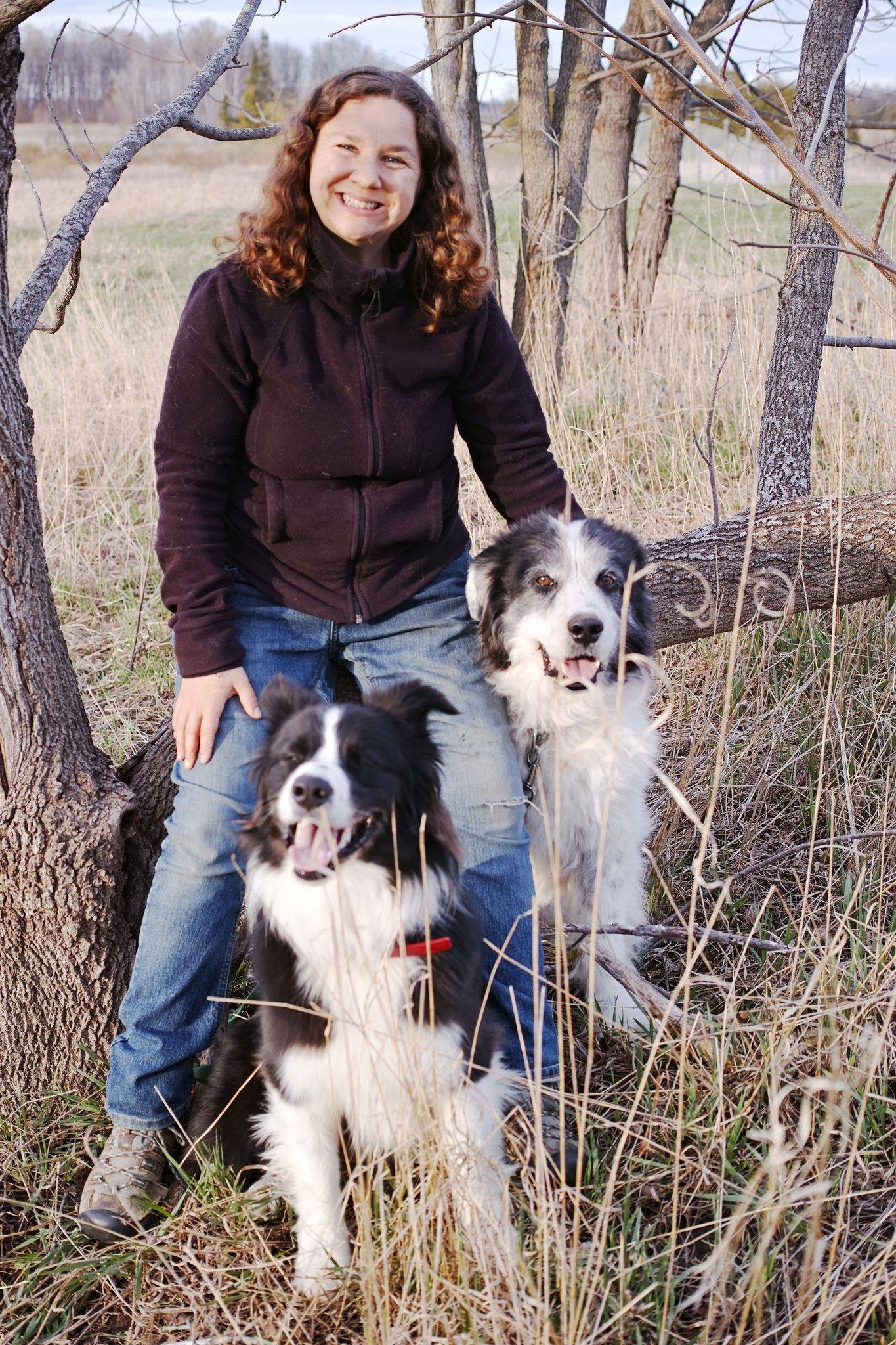 Heather and her two dogs outdoors